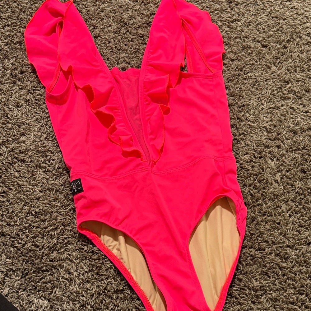 Kandi Kouture neon pink ruffle leotard. Adult Extra small